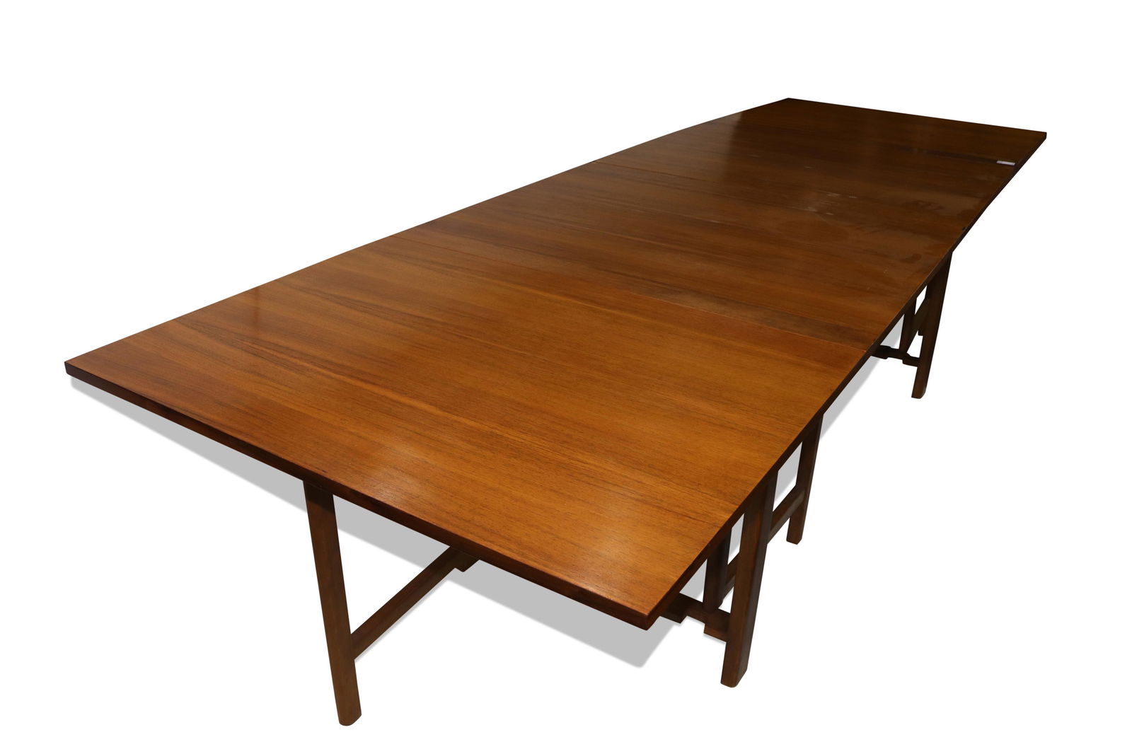Bruno Mathsson style multi position expanding table: Bruno Mathsson style multi position expanding table, executed in teak, can be expanded in multiple positions and sizes, each drop or leaf measures 26"w consisting of four leaves, closed 28.5"h x 7.5"w