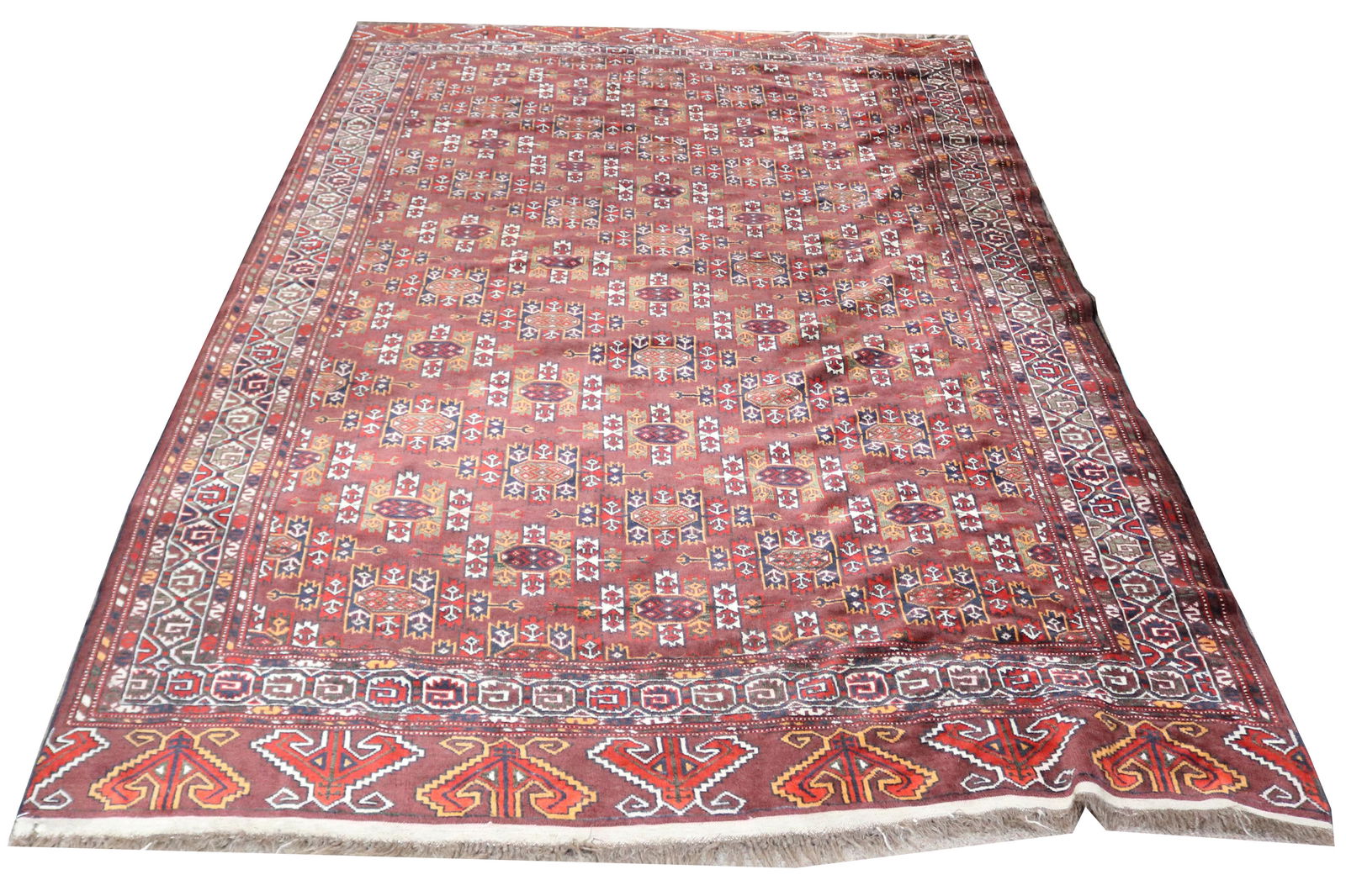 An Afghan carpet, 5'3" x 8' (1 of 3)