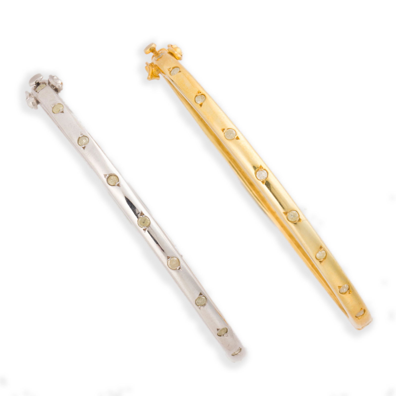 A pair of mismatched diamond and sterling silver bangle (1 of 1)