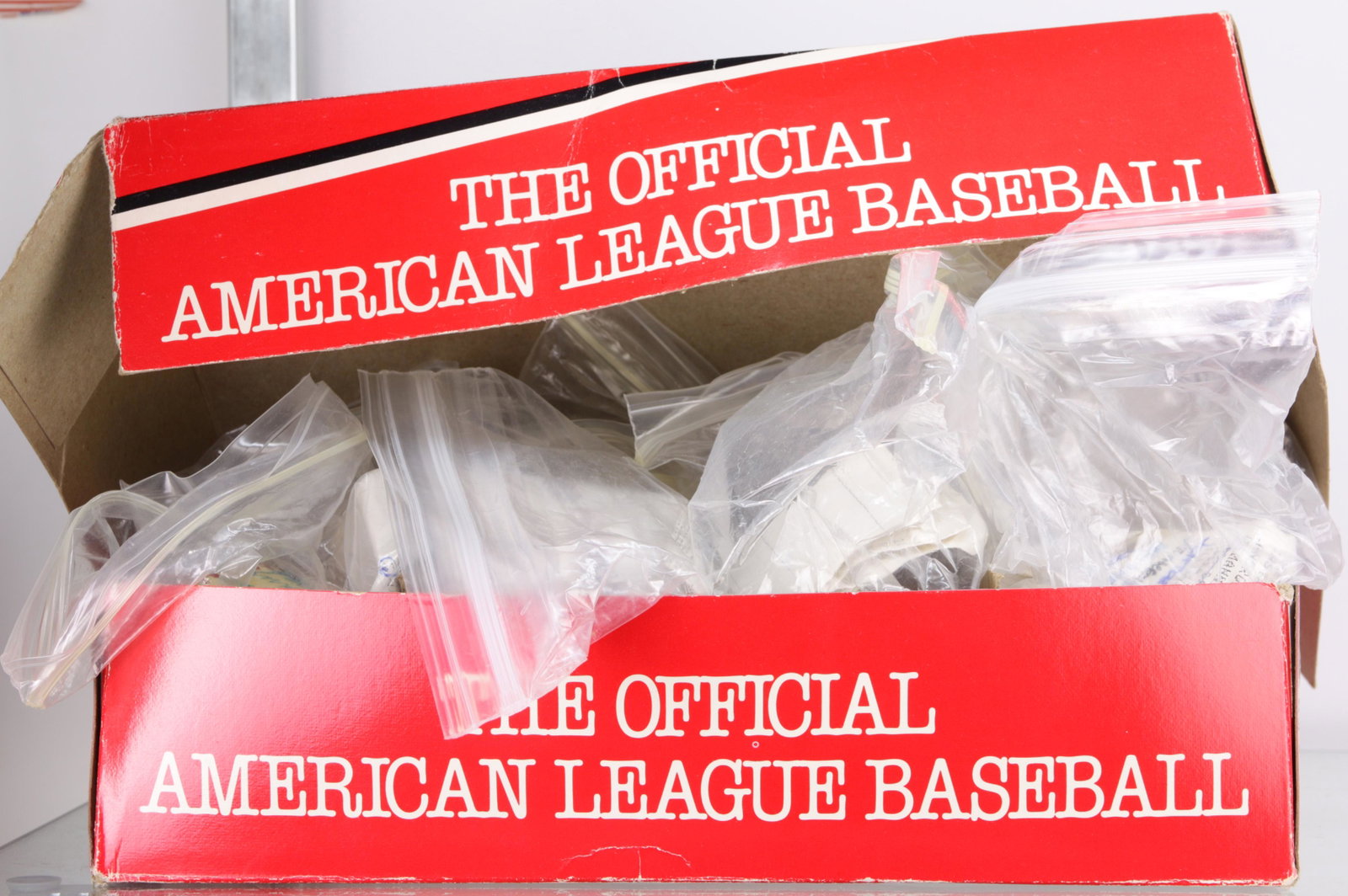 (lot of 12) Baseball group: (lot of 12) Baseball group, bearing team signiatures, including Yankees circa 1985, Brewers circa 1985, Tigers circa 1984, Texas Rangers circa 1984, Mariners circa 1987, Indians circa 1985, Boston Red