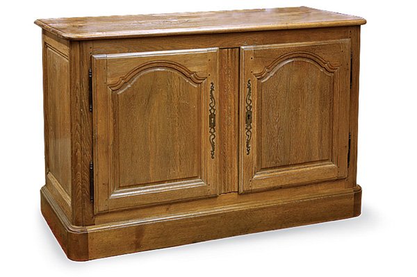 Louis XIV Provincial Oak Buffet, Circa 1800: Louis XIV Provincial oak buffet, circa 1800, having molded doors and raised panel sides, rising on molded base, 34''h x 53''w x 23''d, restorations, (key in office)