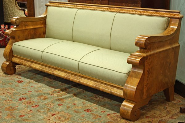 Biedermeier sofa: Biedermeier sofa with satinwood veneers, solid panel arms, rising on scroll feet, 36''h x 81''w x 27''d