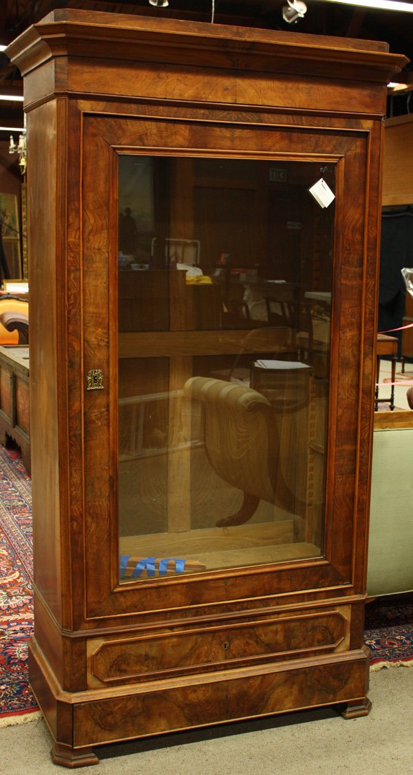 Louis Philippe walnut cabinet, circa 1850: Louis Philippe walnut vitrine, circa 1850 having molded flat cornice above glass panel door over molded drawer with secret drawer base, 82''h x 40''w x 20''d