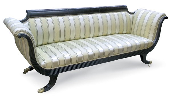 19th century Grecian style sofa: 19th century New York Grecian style ebonized mahogany sofa upholstered in yellow striped damask, sabre legs ending in brass claw feet, 33.5''h x 97''w x 28''d