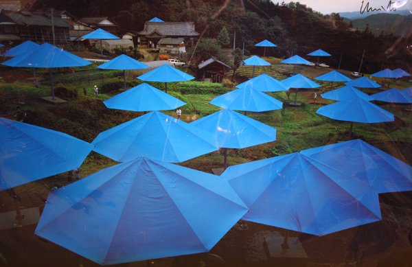 posters, Christo and Jeanne-Claude, Blue Umbrellas: (lot of 2) Unframed posters, Blue Umbrellas, one signed by Christo lower right, largest overall: 40.25''h x 29.5''w