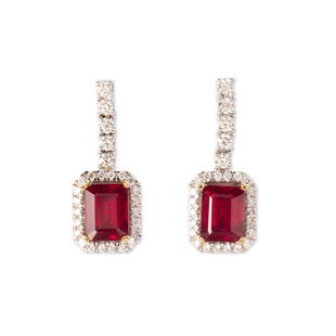 A pair of glass-filled ruby, diamond and fourteen karat: A pair of glass-filled ruby, diamond and fourteen karat white gold earringseach designed as a step-cut glass-filled ruby, weighing approximately 2.30 carats, framed by round brilliant-cut diamonds,