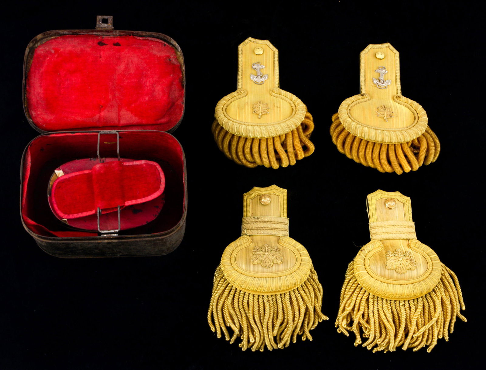 A (lot of 4) Japanese naval dress epaulettes: A (lot of 4) Japanese naval dress epaulettes, each with gold bullion fringe and an embroidered anchor insignia, and one with a leaf insignia and a carrying case, Provenance: The Holt Military Museum, 