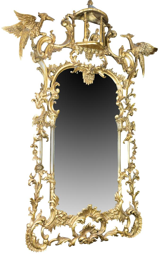 A Chinese Chippendale style giltwood mirror: A Chinese Chippendale style giltwood mirror, having a pagoda-form crest, flanked with hobo birds, above a shaped looking glass surrounded by flower and acanthus accents, 58"h x 30.5"w