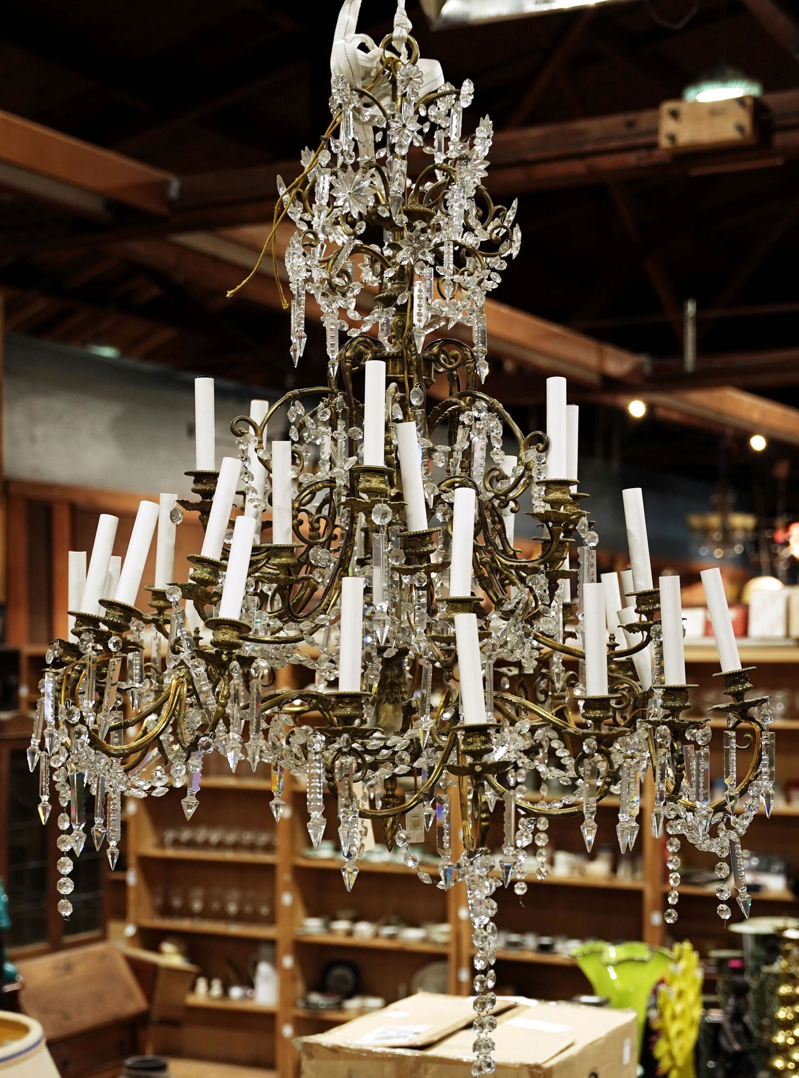 A monumental gilt bronze and crystal 24 light tiered (1 of 1)