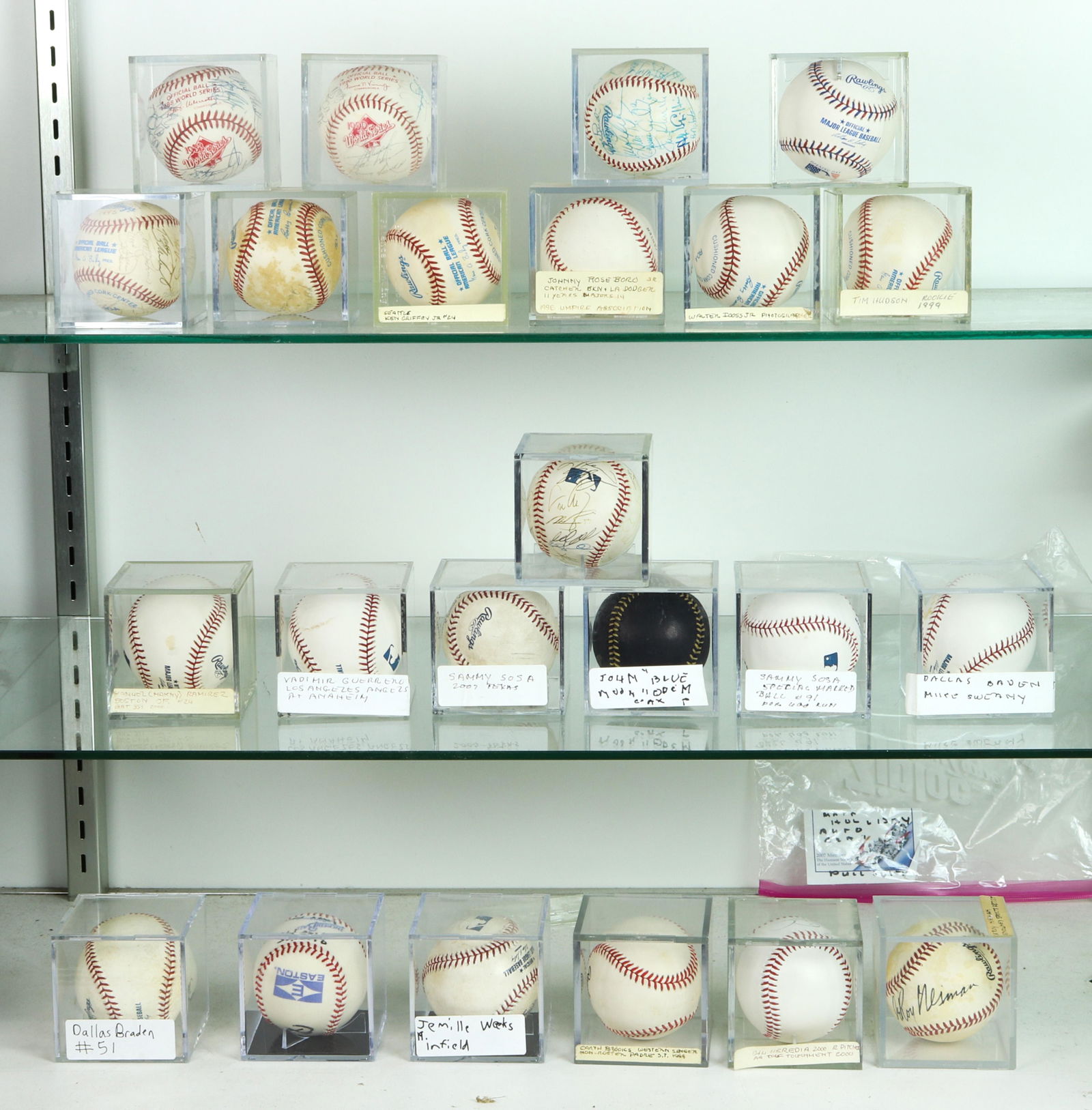 Three shelves of signed mostly Official American League (1 of 4)