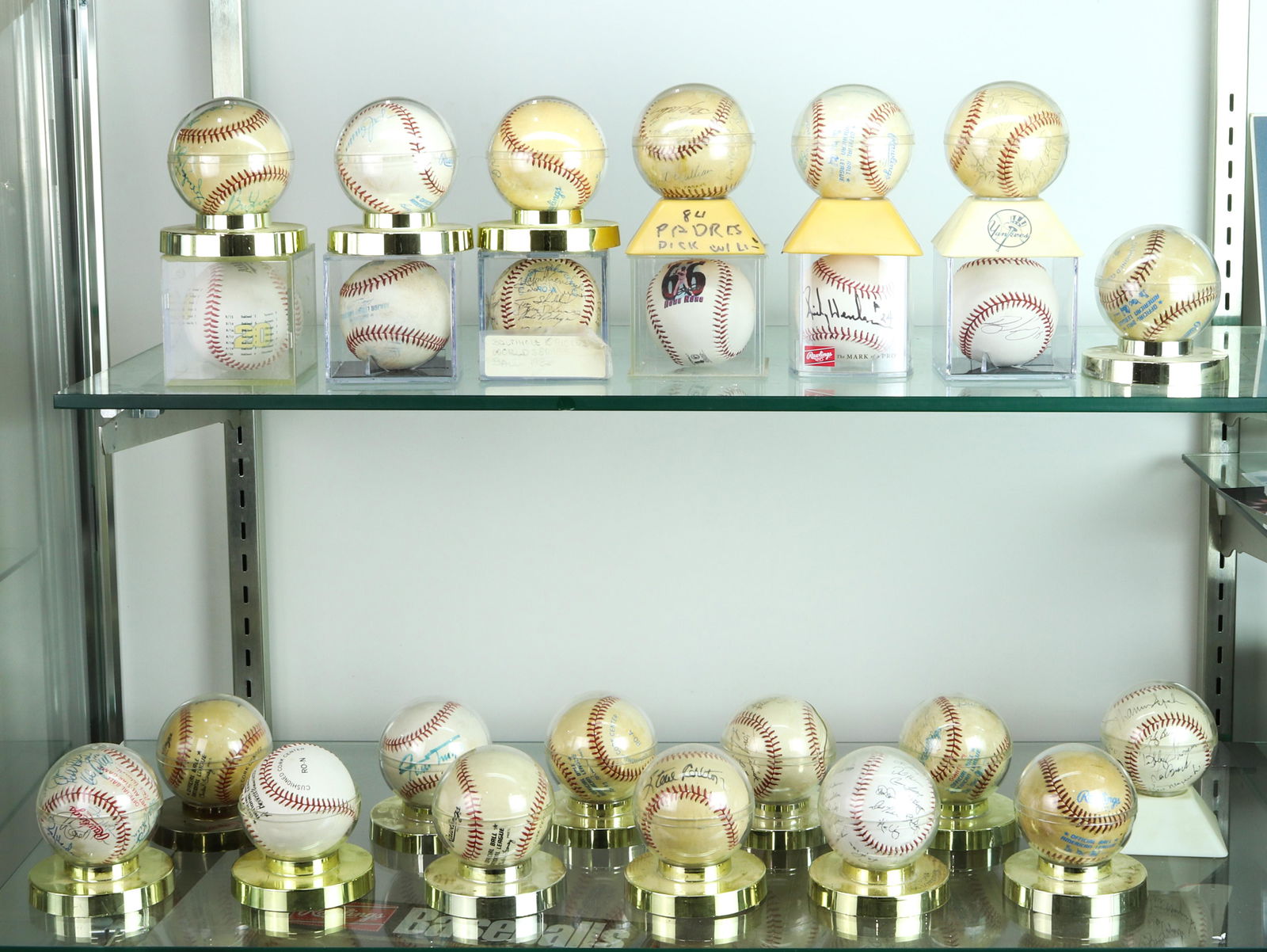 Baseball group, bearing signatures including Yogi Berra (1 of 3)