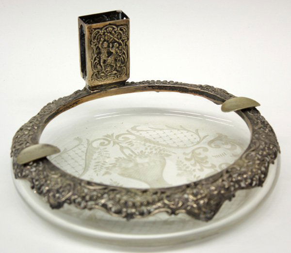 Intaglio cut glass silver mounted smoking stand: Intaglio cut glass, 800 silver mounted smoking stand, circa 1900 with figural repousse match box holder, 4''h x 9''d