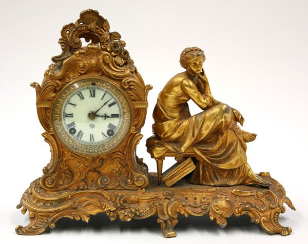 Gilt metal Louis XV style figural mantle clock: Ansonia Gilt metal Louis XV style figural mantle clock with time and strike movement, 11''h X 14''w (key in office)
