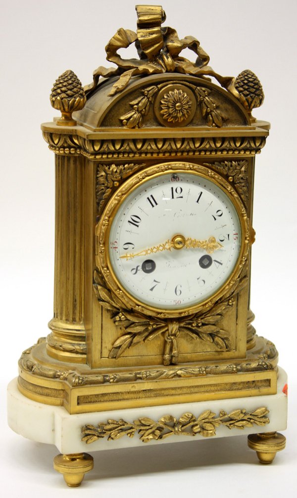 French Dore bronze mantle clock: French Dore bronze mantle clock with porcelain dial, time and strike movement on alabaster base 12''h X 8''w (pendulum in office)