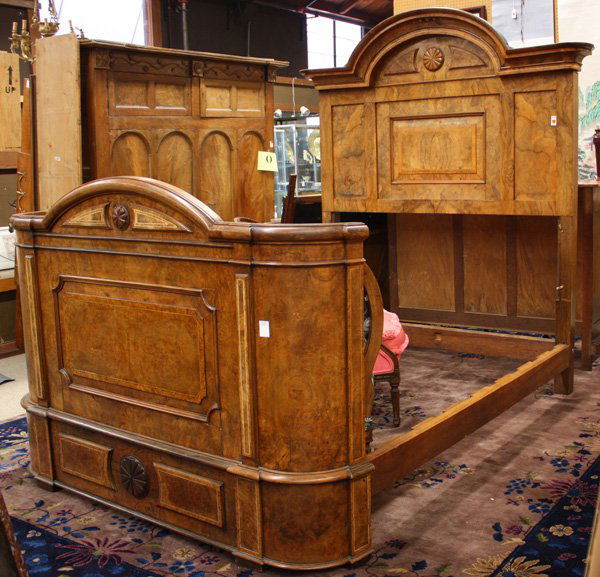 British burlwood bed: British burlwood bed signed F. Thomas, cabinetmakers, Halesowen, Arched crest rail above burl panelled headboard with band inlaid center raised panel, footboard has arched crest above raise panelled i