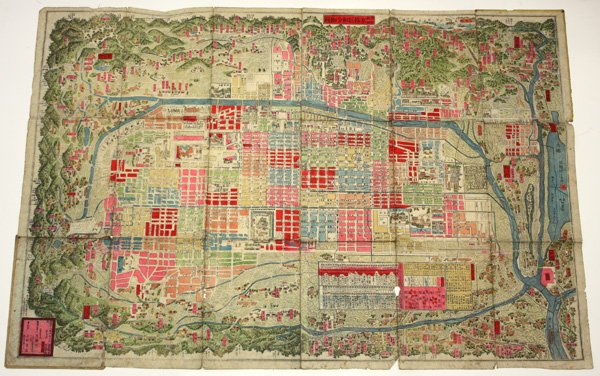 Japanese Woodblock Printed Map, Edo Period, Kyoto: Unframed Japanese woodblock color printed folding map, Meiji Period (1868-1911), entitled Kyoto fu-ku kumiwake saizu, a detailed map of the old capital and its environs, dated Meiji 18.7 (=1885 July),