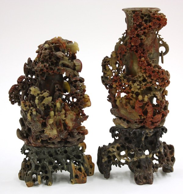 Pair Chinese Soapstone Vases, Figures/Lanscape: Pair of Chinese soapstone vases on stands, late Qing/Republic period, each finely carved and undercut with figures in a flowering landscape with birds, the taller with a couple and sages fronting a lo