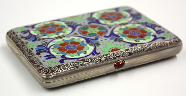 Russian silver enamel cigarette case: Russian 875 fine silver and enamel cigarette case, Moscow, early 20th century, having floral polychrome decoration throughout, red jewel button clasp, gold wash interior, maker's mark NL (translated f