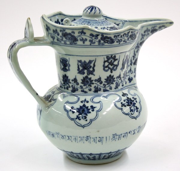 Chinese Abbot's Hat Blue/White Porcelain Pitcher: Chinese monk's cap underglaze blue decorated ewer, based on a Ming dynasty prototype (qing hua seng mao hu), of finely potted compressed globular form rising to a broad slightly flared neck and a step
