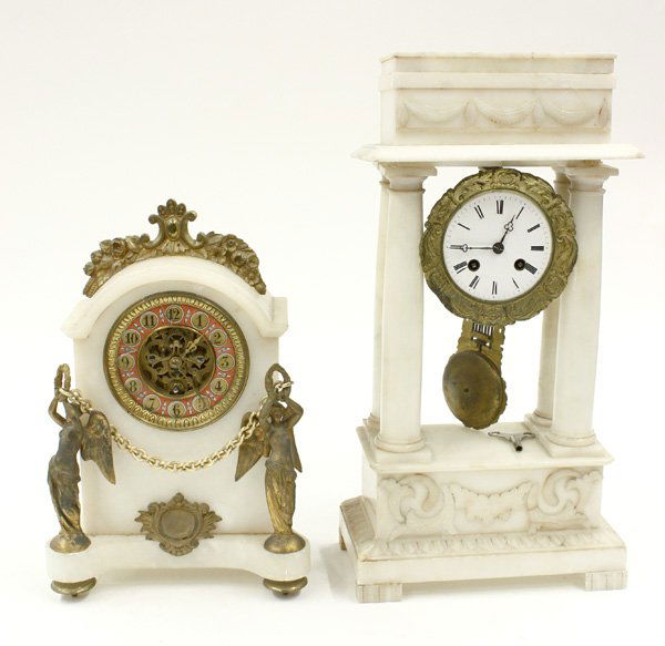 Alabaster mantle clocks: (lot of 2) Alabaster mantle clocks, 1 French alabaster portico mantle clock having a gilt bezel around enamel dial with gilt pendulum,loose foot, 1 unsigned mantle clock with floral crown around arche