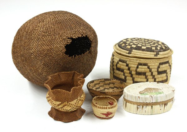 Native American baskets: (lot of 6) Native American baskets including a damaged Paiute seed jar, Makh eagle miniature basket missing lid, porcupine quill knick knack basket with beaver design, Pima design miniature, Papgo lid