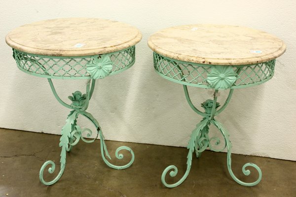 pastel green painted wrought iron gueridons: Pair of pastel green painted wrought iron and marble gueridons having an open cross-hatch frieze set with rosettes on tri-scroll feet accented by acanthus, 26''h x 22''diam.