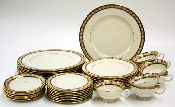 Lenox partial table service: (lot of 32) Lenox partial table service with gold and cobalt bellfower pattern, retaining Gumps San Francisco retailer's mark, comprising eight dinner plates 10.5'', eight salads 8'', eight breads 6''