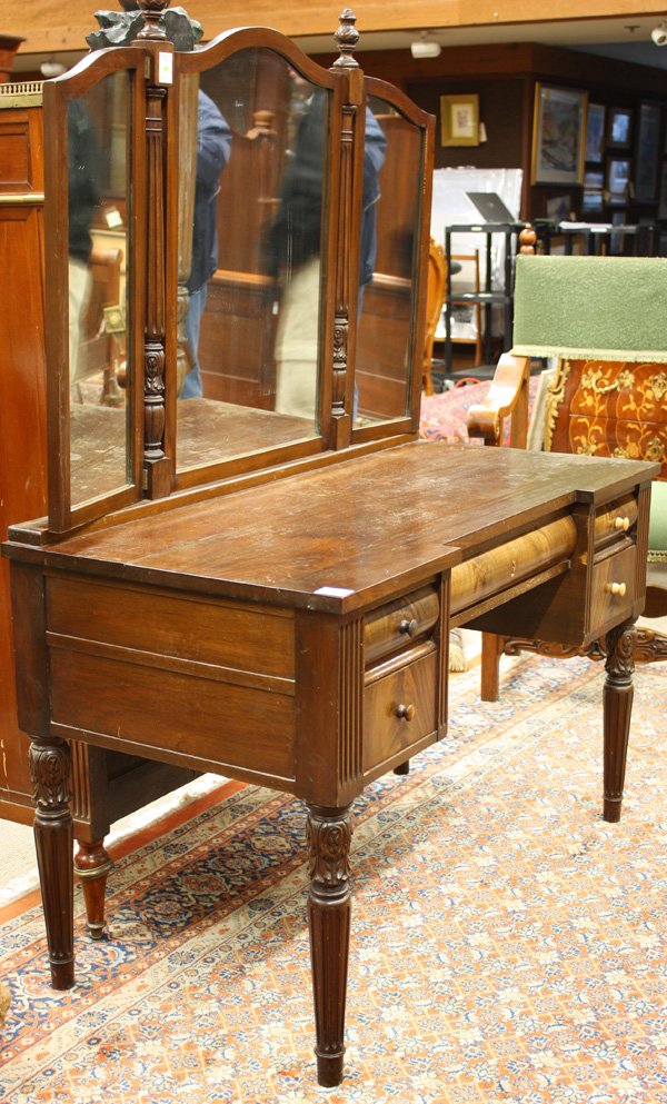 Classical Revival mahogany bedroom suite: Four piece Classical Revival mahogany bedroom suite 1910-1930, consisting of a four poster bed having carved pineapple form finials above fluted and turned posts, 83''h x 59''w x 75''l (inside dims),