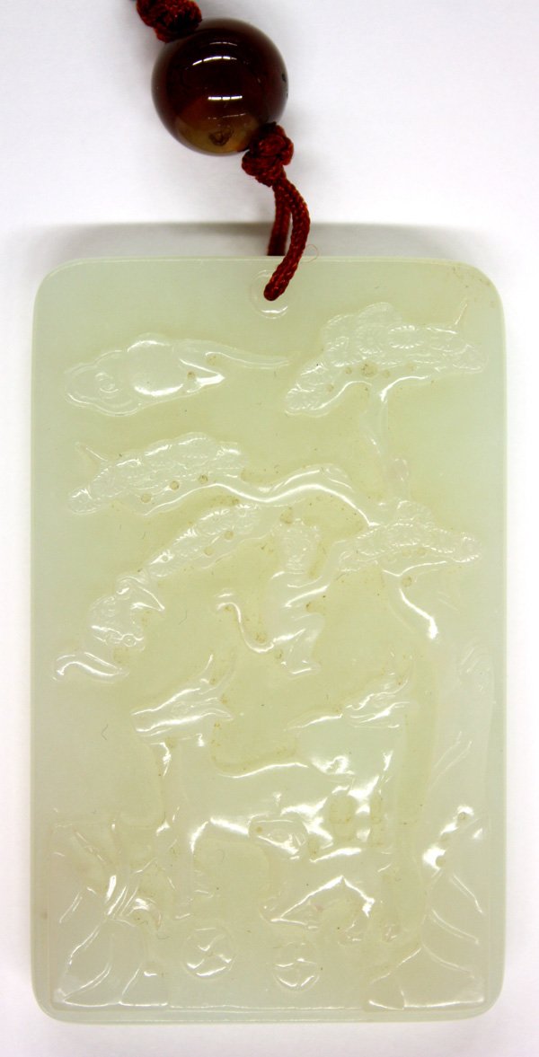 Chinese Jade Plaque, Ram: Chinese rectangular jade plaque, carved with three rams under a gnarled pine from which a playful monkey hangs, reversed by the characters 'san yang kai tai' below a pair of confronted chilong, the se
