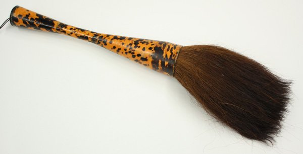 Chinese Oversize Brush/Tortoise Shell: Chinese very large calligraphy brush, the waisted handle sheathed in tortoise shell extending over the large ferrule securing a large head of pony hair, 19''l