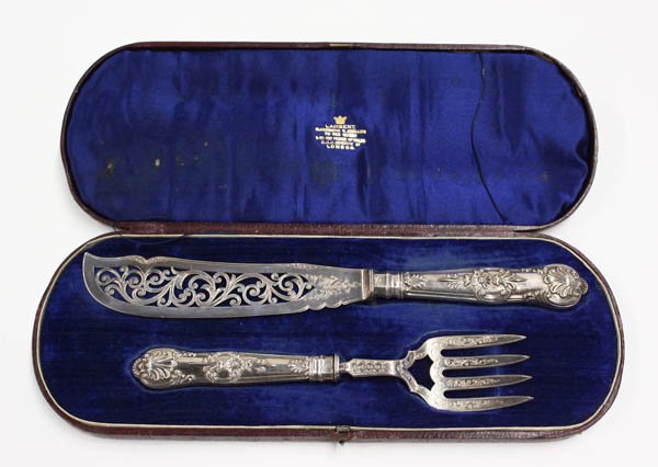 Birmingham sterling silver fish service: Cased Birmingham sterling silver fish service by John Gilbert, date marks corresponding to 1869, with pierced scrollwork to knife blade and raised foliate and shell pattern to handles, the blade and t