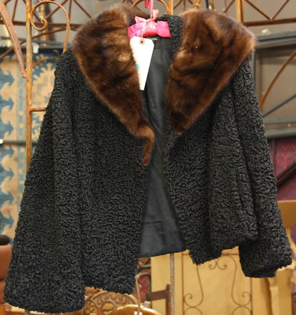 Vintage black curly lamb jacket: Vintage black curly lamb jacket with a mahogany mink collar, retailed by Livingston Brothers, approximately 23'' long, `15.5'' shoulders, 25'' sleeves