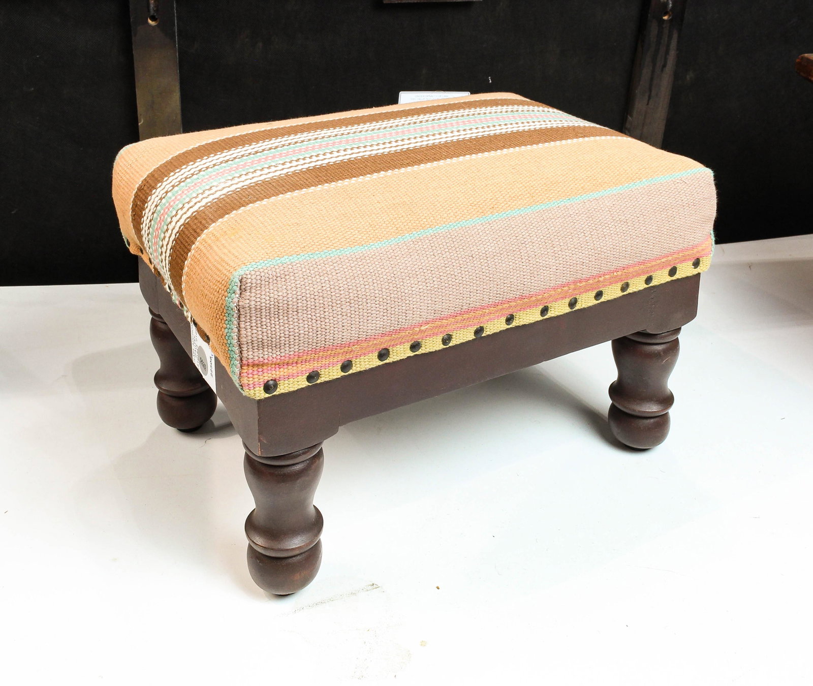 A small flatweave upholstered footstool: A small flatweave upholstered footstool, 9"h x 15"w