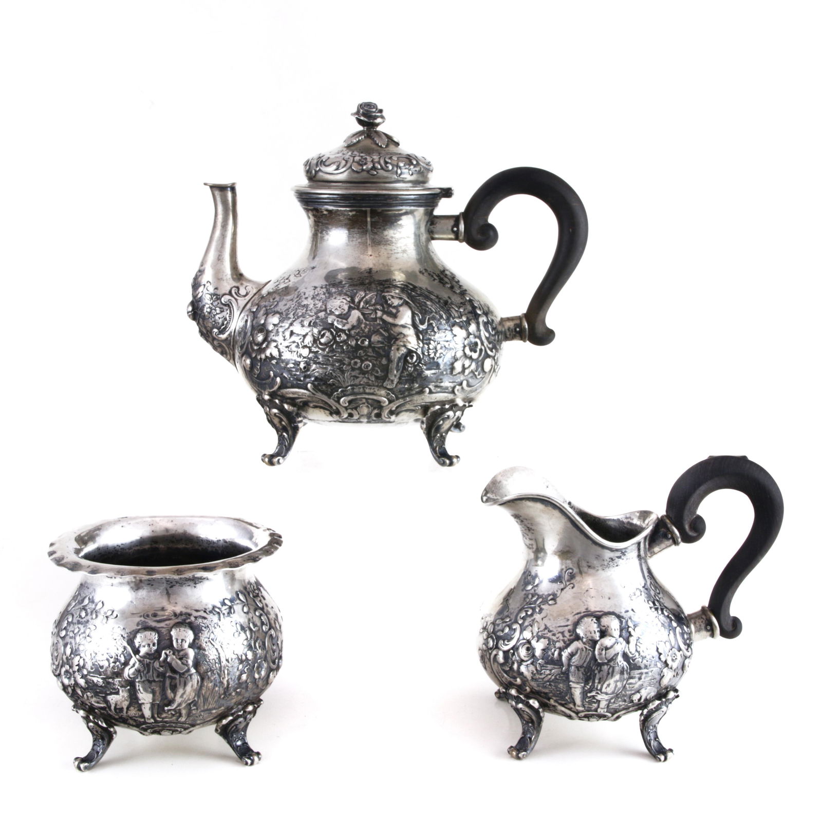 A (lot of 3) German .800 silver tea service: fashioned (1 of 2)