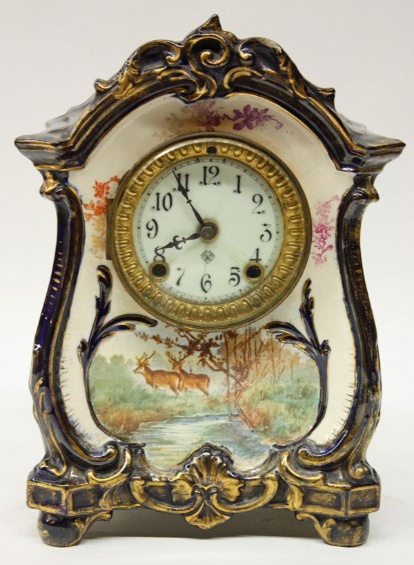 Ansonia mantel clock: Ansonia mantel clock, with quartz movement, in the 'La Lille' pattern signed Royal Bonn china case, 10.5''h x 7.5''w