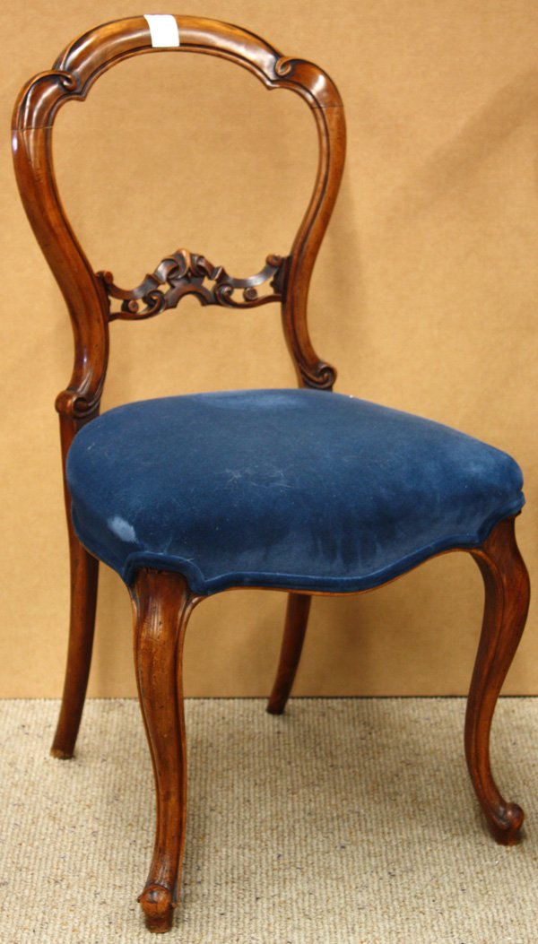 Edwardian balloon back side chairs: Set of four associated Victorian balloon back side chairs, circa 1850, having carved back supports, the seats in blue velvet upholstery, and raised on cabriole legs, 34''h