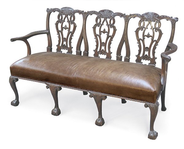 Chippendale mahogany tri-splat settee: Chippendale mahogany tri-splat settee, having heavily carved crest rail and splats, ending in claw and ball feet, circa 1870, 28.5''h x 66''w x 23.5''d