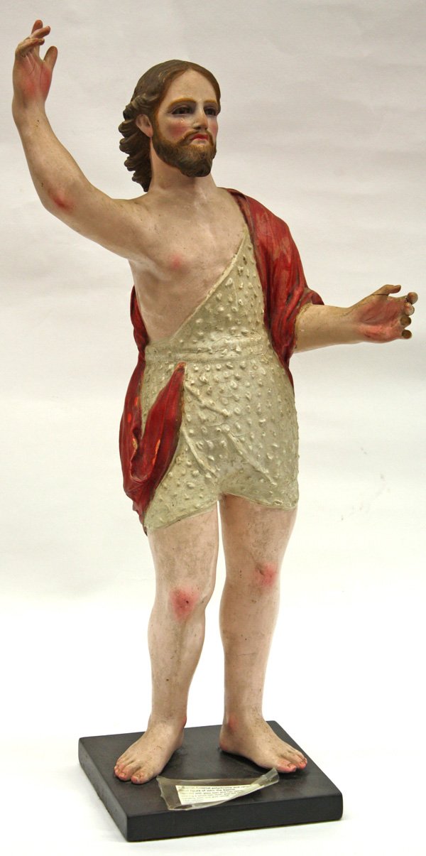 Polychrome carving of John The Baptist: Polychrome wood sculpture, John The Baptist, Spanish Colonial, 19th Century, figure has glass eyes and hair lashes, overall: 23.5''h x 11''w x 8.5''d