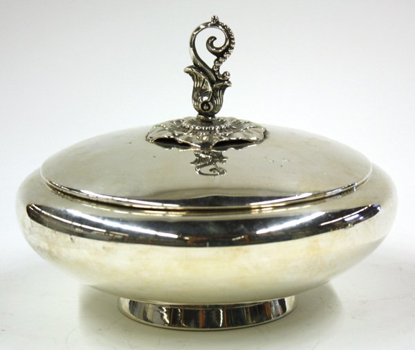 J. Wagner & Son art deco covered bon bon dish: J. Wagner & Son art deco footed and covered bon bon dish, the openwork handle of stylized foliate design and protruding from a central low relief flower, 5.5''h x 7''d