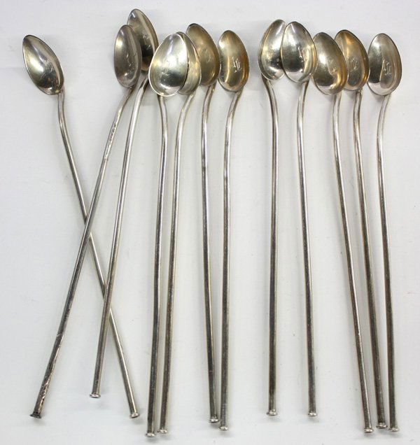 American sterling silver iced tea stirrers: Set of twelve American sterling silver iced tea stirrers, monogrammed 'H' to the bowls, the handles hollowed for use as straws, 5 troy oz.