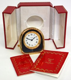 Cartier desk clock: Cartier quartz desk clock, with certificate of authenticity and original fitted case