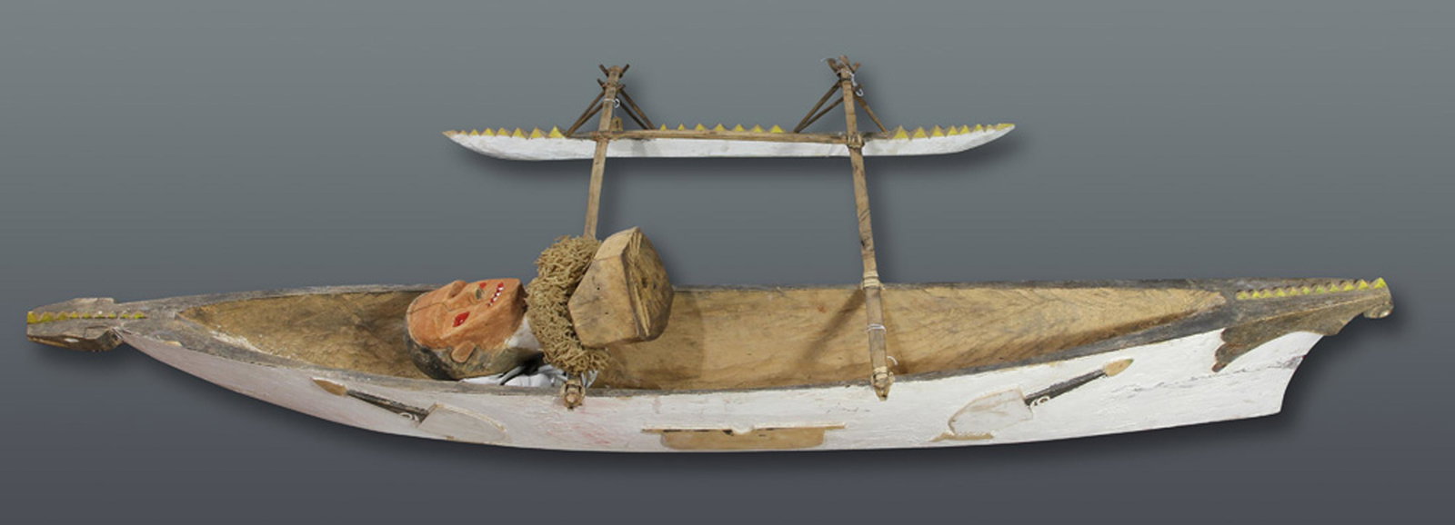 A model outrigger canoe used for ceremonies (1 of 4)