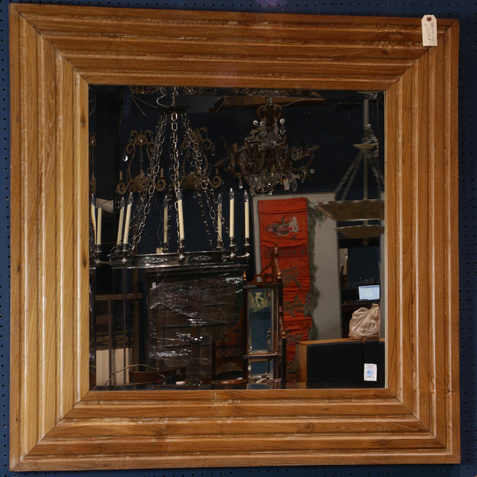 Contemporary teak mirror, top, sides and bottom all: Contemporary teak mirror, top, sides and bottom all decorated with horizontal and vertical bands, 47"h x 47"w