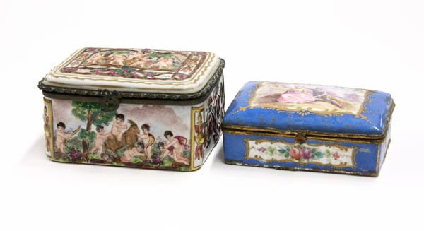 Porcelain polychrome decorated dresser boxes: (lot of 2) Porcelain polychrome decorated dresser boxes, one with a classical painted frieze and floral decoration over the entire body, the hinged lid opens to reveal floral sprays on a white ground,