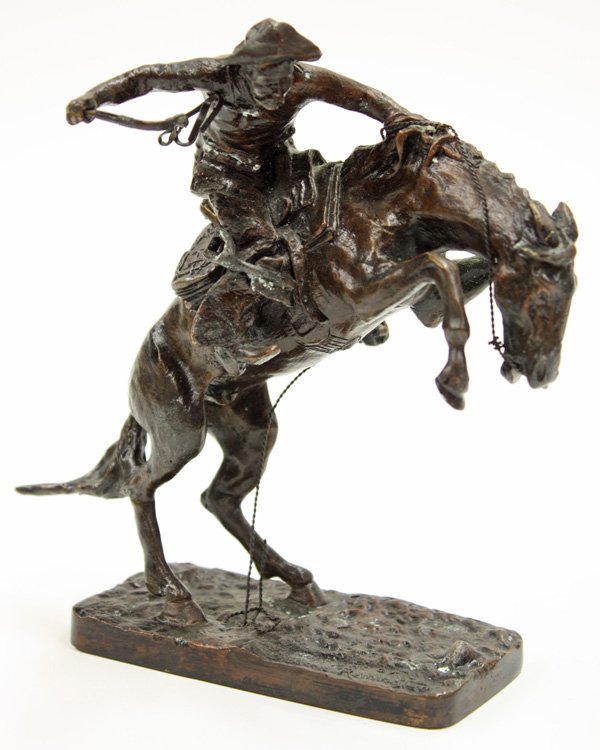 Bronze, after Remington, Bronco Buster: Bronze sculpture, ''The Bronco Buster,'' after Frederic Remington (American, 1861-1909), title affixed under base, 1988 recast, overall: 5.75''h x 4.25''w.