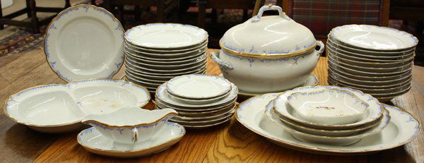 Partial set of KPM porcelain: (lot of 44) Partial set of KPM porcelain table service, the gilt rim around a blue decorated border on a white ground, consisting of twenty-seven luncheons 9.5'', six salads 8.5'', two breads 6.75'',