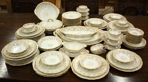 Haviland and Limoges porcelain dinner service: (lot of 96) Haviland and Limoges porcelain dinner service decorated with pink flowers and gilt borders against a white ground, including 11 each of service plates, dinner plates, salad plates, bread p