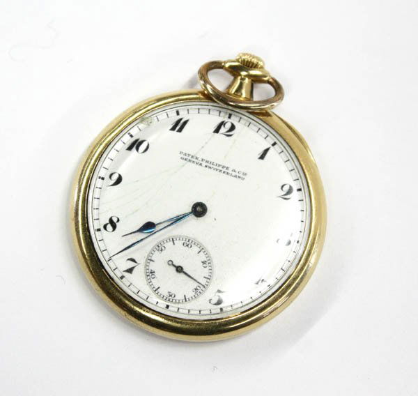 PATEK PHILIPPE pocketwatch: Open face PATEK PHILIPPE pocketwatch; of 18k yellow gold, having Arabic chapters, blued spade hands and subsidiary seconds dial (evidence of crazing). 45 mm case, monogrammed. Eighteen jeweled movemen