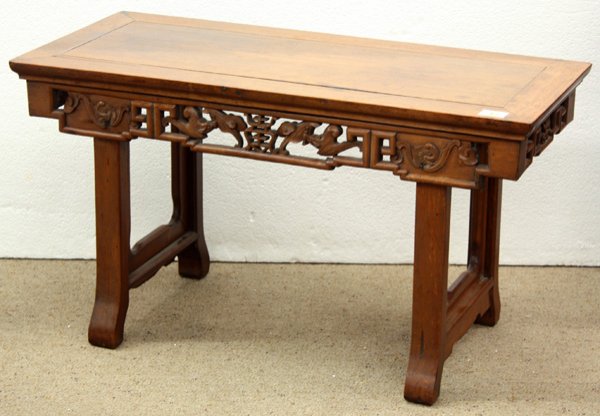 Chinese Hardwwod Side Table: Chinese hardwood side table, the top set with a rectangular panel over an apron pierced with a shou character bracketed by two pairs of dynamic bats, the rectangular supports braced by shaped open pan