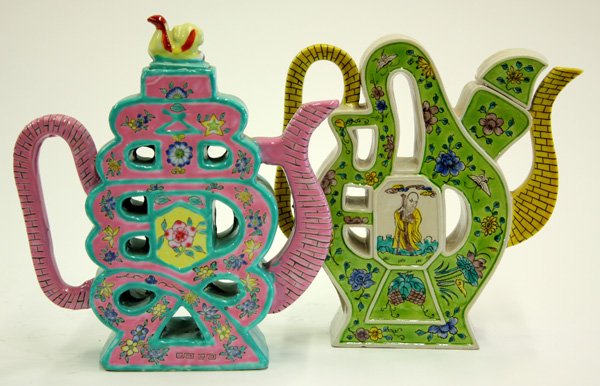 Enameled Chinese Porcelain Puzzle Pot: (lot of 2) Chinese enameled porcelain puzzle pots, the first decorated in the famille verte palette with floral sprigs on a green ground centered by a reserve of Shoulao and reversed by Magu, contrast